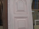 Thumbnail view of a white-painted raised panel door featuring an elegant arched top, from the Marrickville Joinery catalogue.