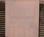Thumbnail of a white-painted timber door with arched top and raised panel design, crafted at Marrickville Joinery.