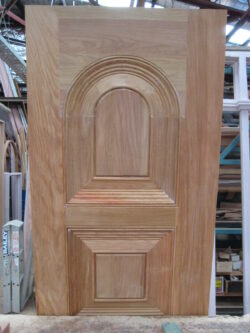 Close-up detail of an arched timber door corner, showcasing the precision joinery and quality craftsmanship of Marrickville Joinery.