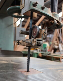 Custom timber door components laid out in the Marrickville Joinery workshop during production, showing the scale and detail involved in bespoke door manufacturing.