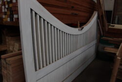 Ornate curved fanlight arch featuring slender vertical balusters, crafted by Marrickville Joinery for a heritage building restoration requiring traditional architectural detailing. Decorative Curved Fanlight with Balusters