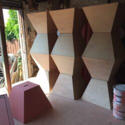 Decorative timber cladding panels featuring a geometric diamond pattern, being crafted in the workshop. Geometric Diamond Cladding Panels