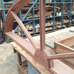 Large curved timber arch sections being constructed, used in heritage building restoration and feature entrances. Curved Heritage Arch Components