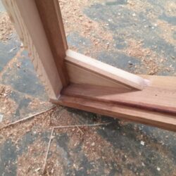 Close-up of a precisely crafted timber door frame corner joint, demonstrating the quality of Marrickville Joinery's woodwork.