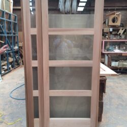 Multi-shelf solid timber shelving unit, custom-made to suit residential or commercial interiors. Timber Shelving Unit