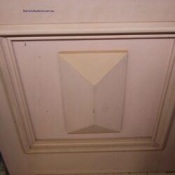 A plain panel door in a natural or primed finish, suitable for heritage or contemporary interior applications.
