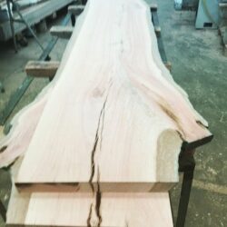 A natural curved live-edge timber piece, showcasing the beauty of the natural wood grain for decorative applications. Live-Edge Decorative Timber Piece
