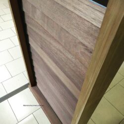 Close-up of an unfinished timber corner showing natural grain and texture prior to sanding and finishing. Raw Timber Corner Close-Up