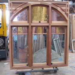 Heritage double entrance doors with an arched fanlight window above, a hallmark of Federation residential architecture.
