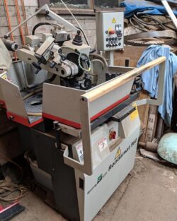 Woodworking spindle moulder or router shaper machine used in the workshop for producing decorative moulded timber profiles.