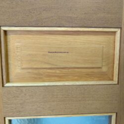 Traditional heritage timber door with a single large raised rectangular panel, shown in natural timber finish.
