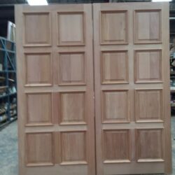 Traditional six-panel heritage door in natural timber, showing the classic arrangement of raised rectangular panels.