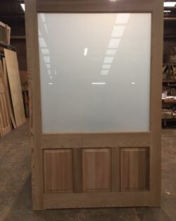 Close-up of a smooth white painted flat panel surface, showing a finished painted result for a door or wall element.