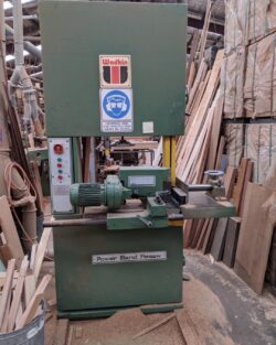 Woodturning lathe and related machinery in the workshop, used for turning timber components such as columns, newel posts and balusters.