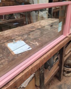 Long workshop benches with timber materials, showing the production setup within the Marrickville Joinery workshop. Workshop Benches and Materials